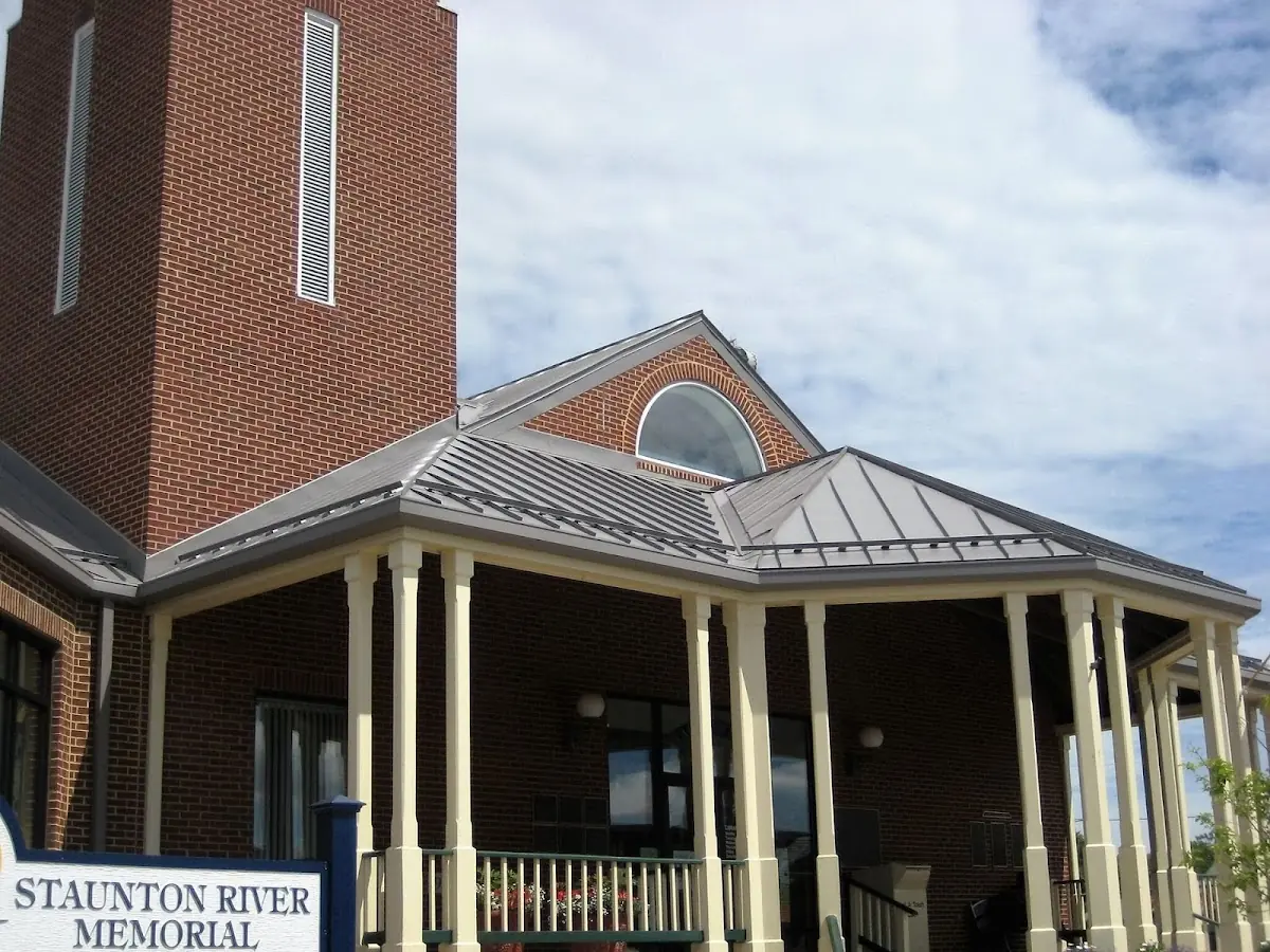 Skilled roofing craftsmen working on a residential roof in Nether Providence